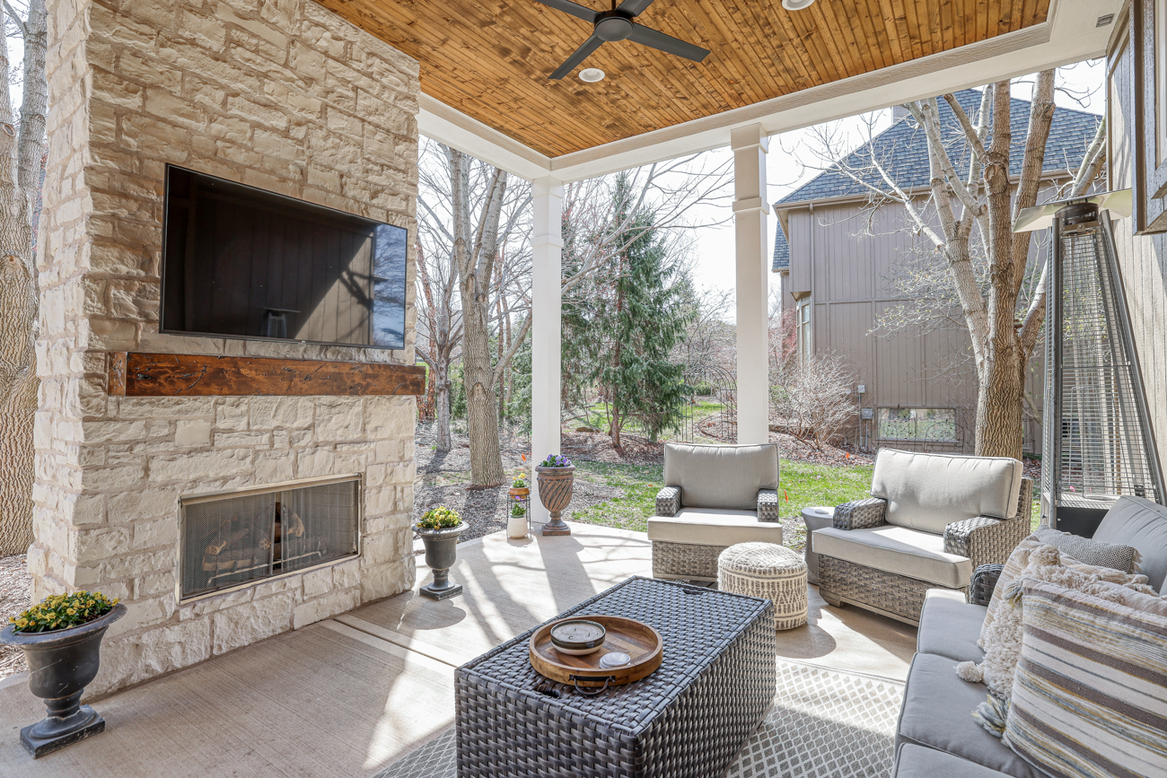 outdoor space with fireplace